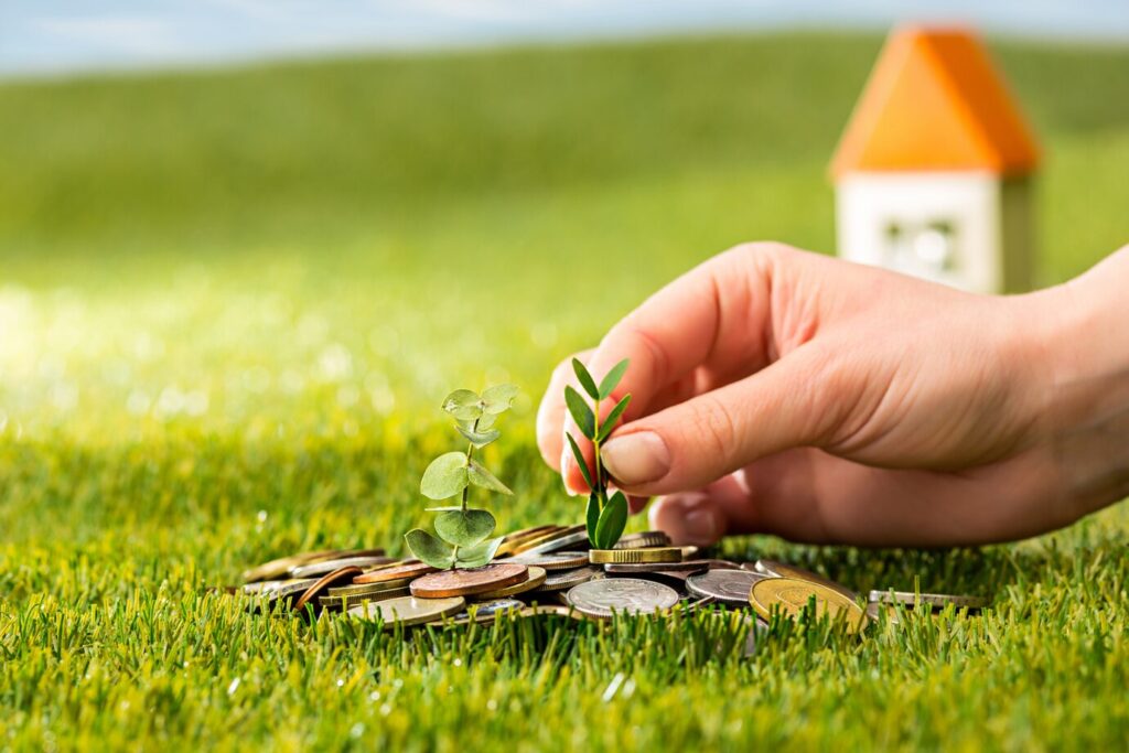 plant growing coins glass jar money green-grass